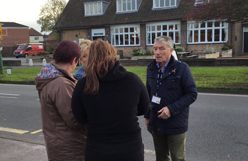 Cllr Brian Holmes talking to residents of Shirley West